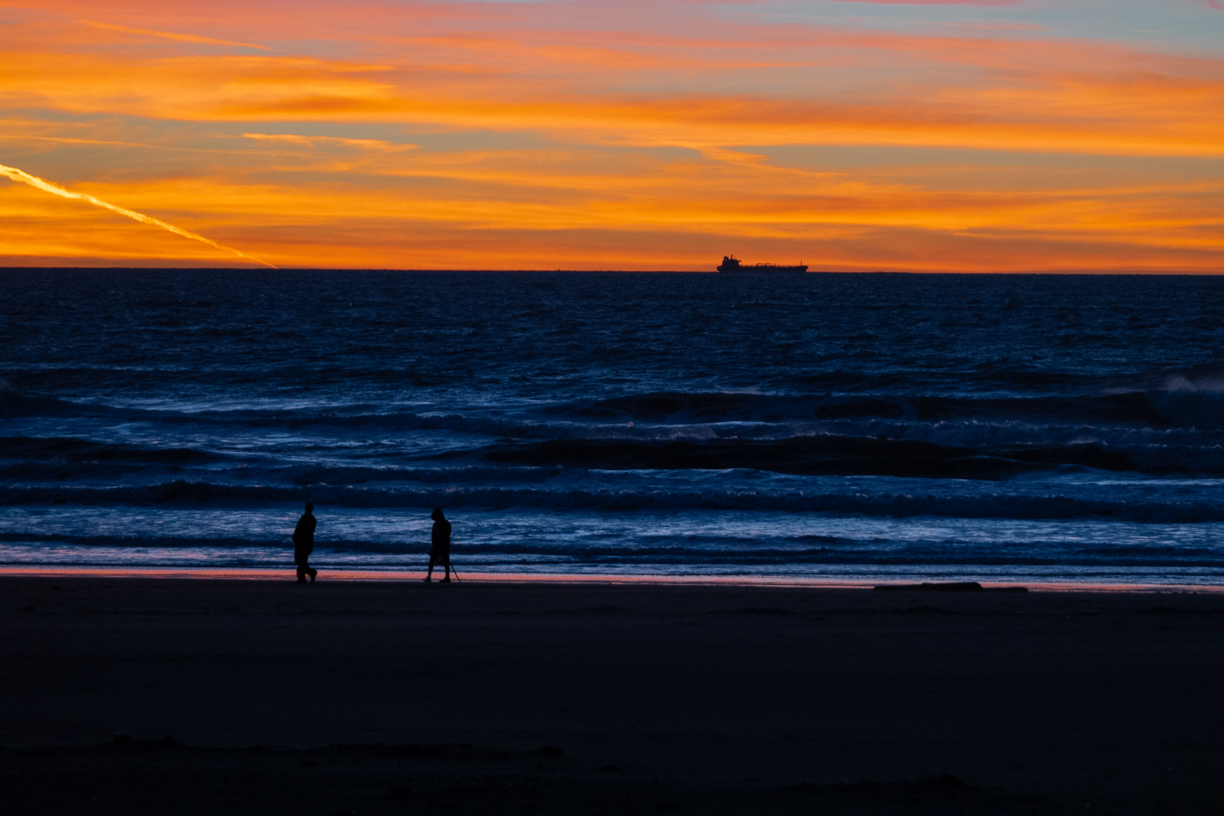 On the beach at night.